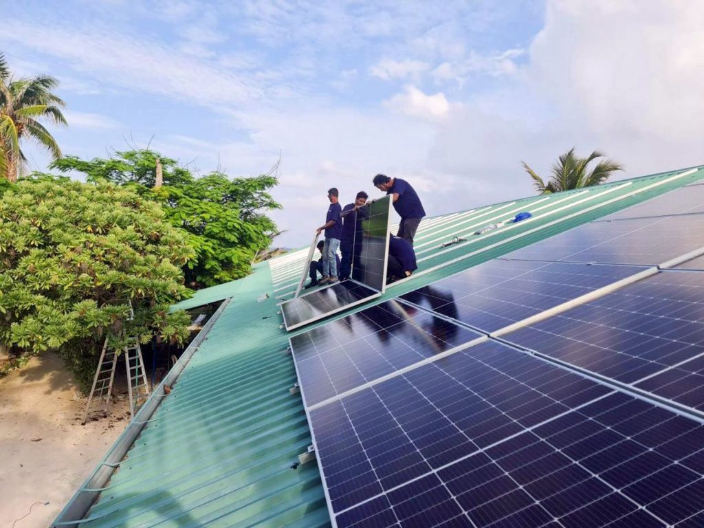 installing solar panels a canareef resort maldives